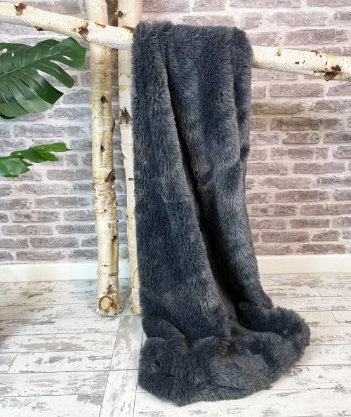 Medium length, plain grey fake fur blanket