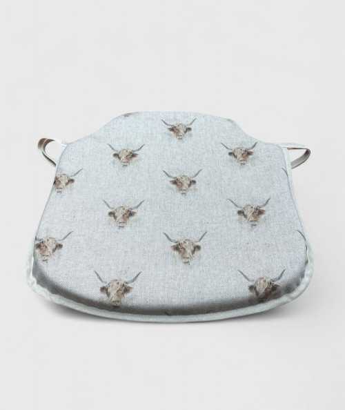 Spindle shaped seat pads with a Highland cattle print