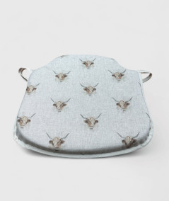 Spindle shaped seat pads with a Highland cattle print