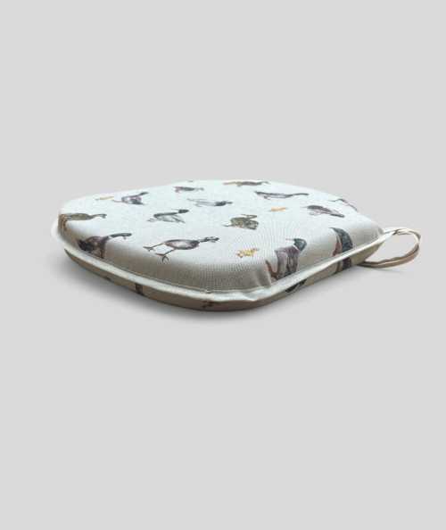 Duck printed spindle shaped seat cushions
