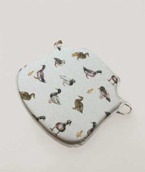 Non-slip beige spindle shaped seat pads with a mallard duck design