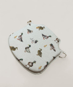 Non-slip beige spindle shaped seat pads with a mallard duck design