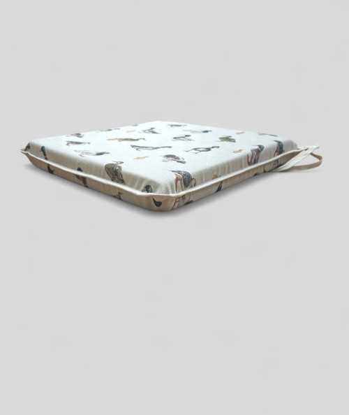 Square shaped non-slip seat cushions in beige with a modern duck design