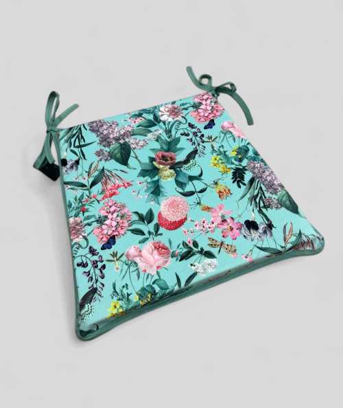 Luxury tapered chair pads in a soft aqua velvet with a summer floral print