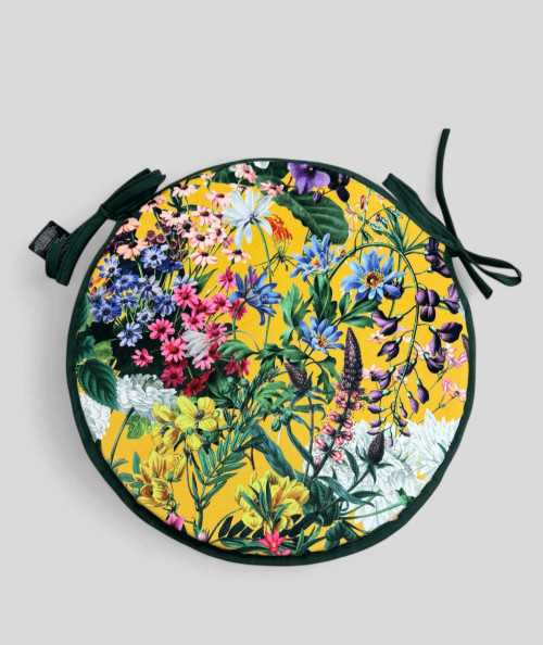 Luxury round yellow coloured velvet bistro seat pads with a multicoloured floral print