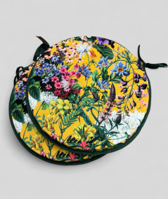 Luxury round yellow coloured velvet bistro seat cushions with a multicoloured floral print