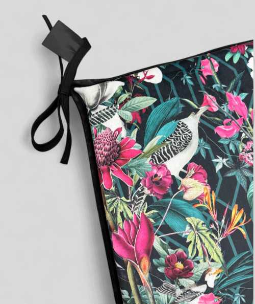 Tropical printed velvet, multicoloured tapered chair cushions on a black base