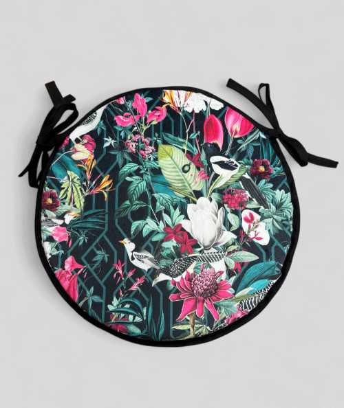 Luxury round black coloured velvet bistro seat pads with a multicoloured tropical print