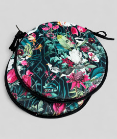 Luxury round black coloured velvet bistro chair pads with a multicoloured tropical print