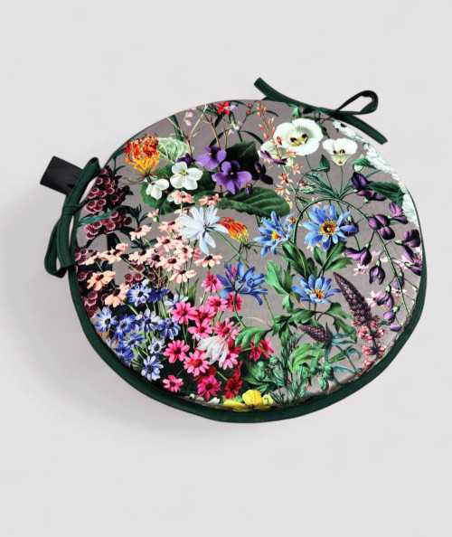 Luxury circular taupe coloured velvet bistro seat pads with a multicoloured floral print