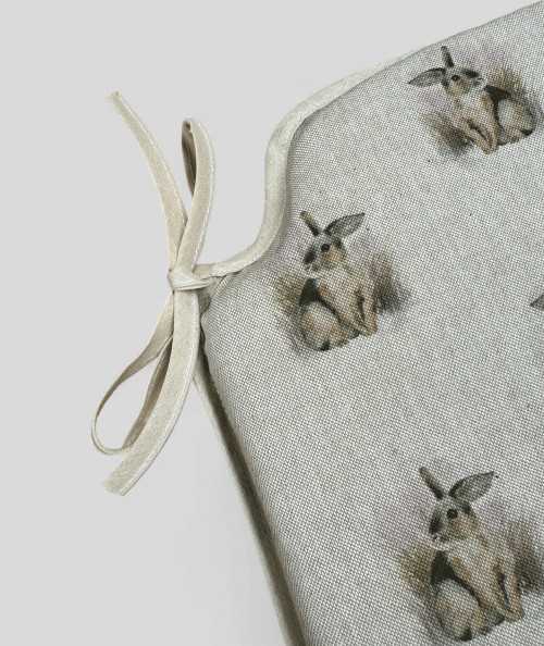 Spindle shaped chair pads with a small rabbit design