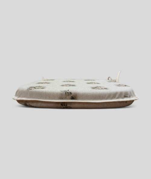 Beige spindle shaped non-slip seat pads with a small rabbit design