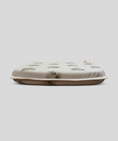 Beige spindle shaped non-slip seat pads with a small rabbit design