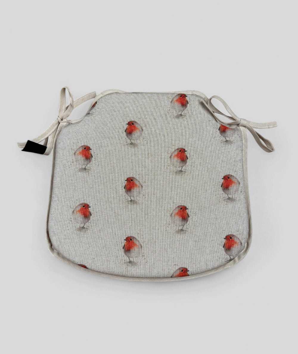 Beige spindle shaped non-slip seat pads with a red robin print