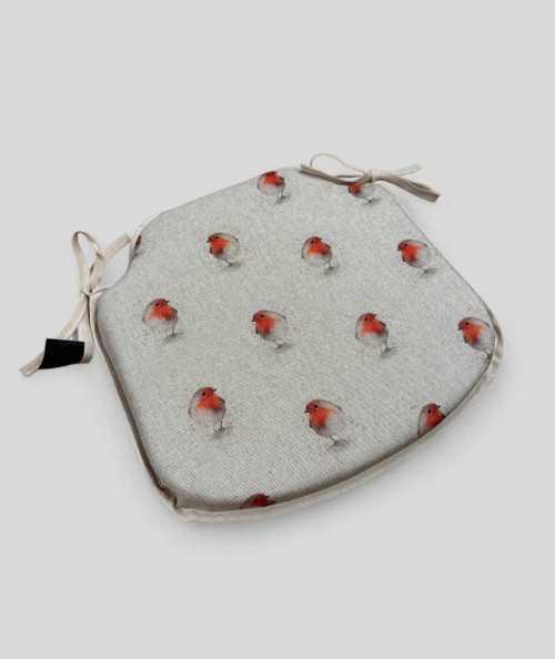 Beige, extra thick spindle shaped non-slip seat cushions with a red robin print