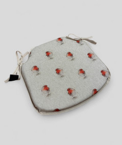 Beige, extra thick spindle shaped non-slip seat cushions with a red robin print