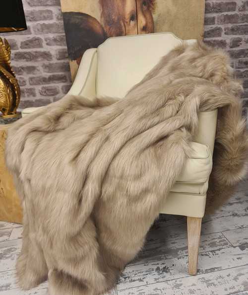 Long haired plain beige faux fur sofa throw