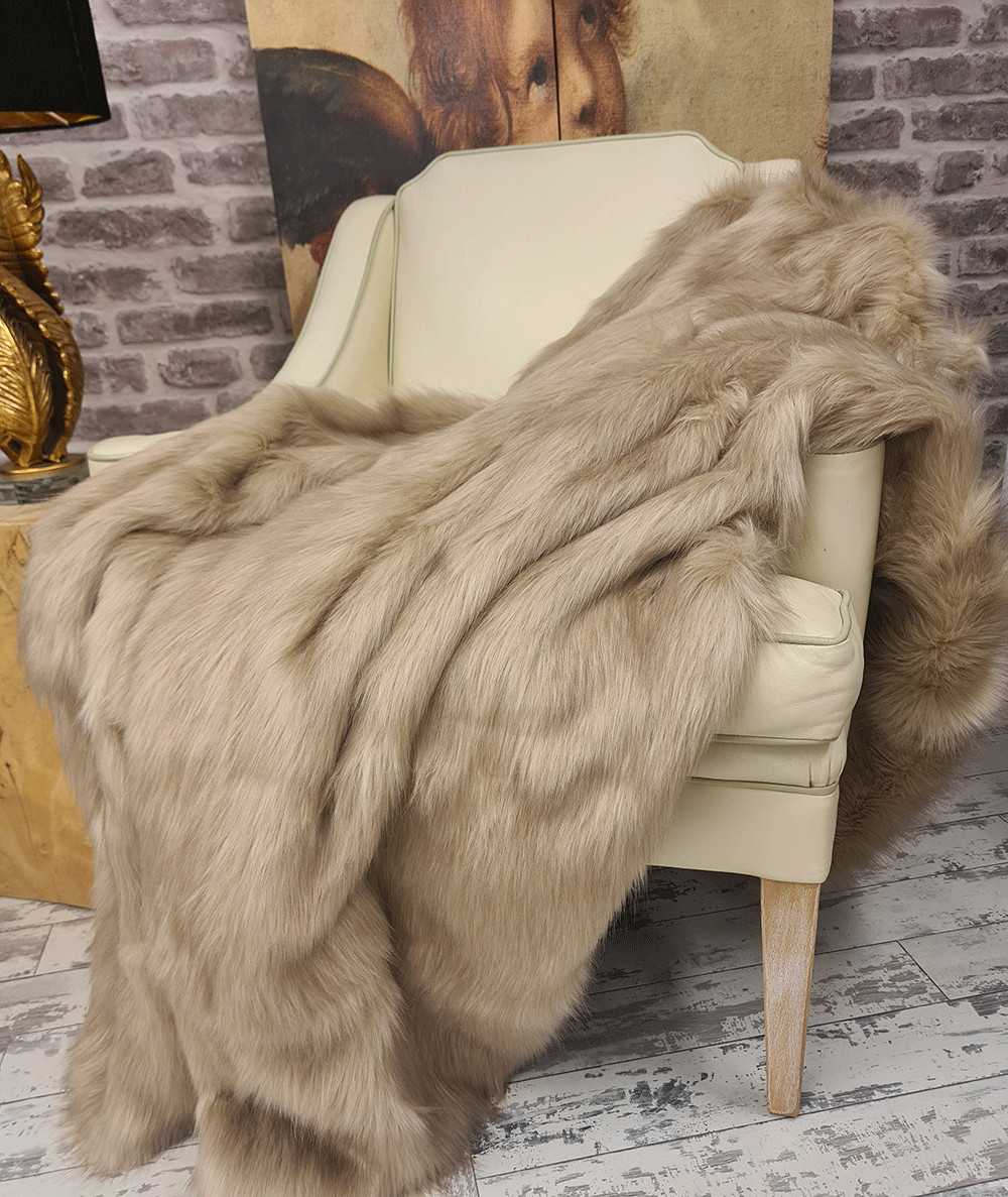 Long haired plain beige faux fur sofa throw