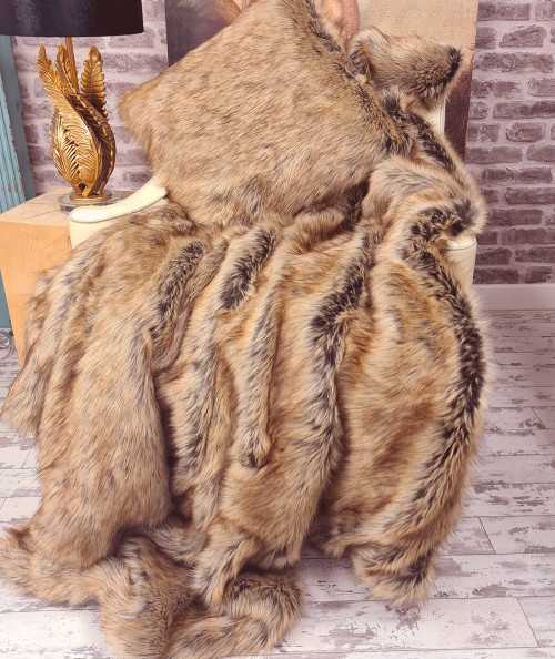 Luxury long-haired beige and brown faux fur throw