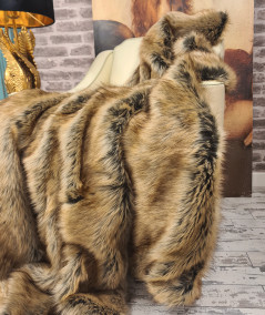 Luxury long-haired warm beige and brown faux fur sofa throw