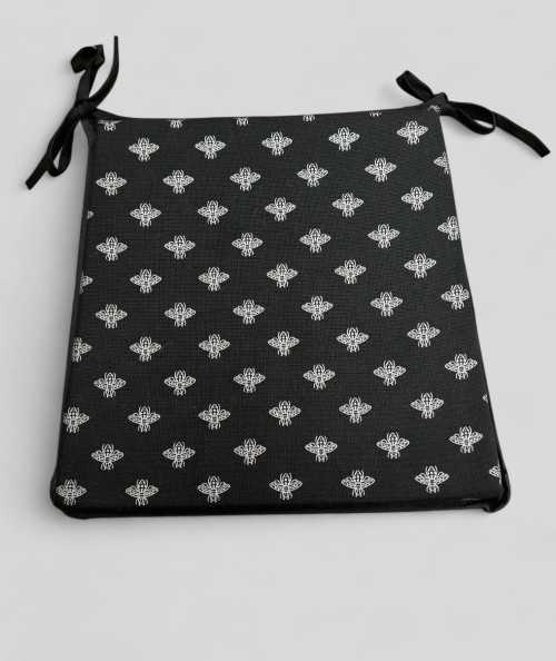 Black tapered seat pads with a silver foil small bee design
