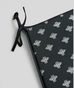 Black tapered seat cushions with a silver foil small bee design