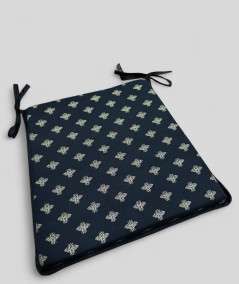 Black tapered chair cushions with an all over small gold bee print