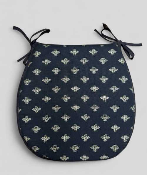 Black classic D shaped seat pads with an all over small gold bee print
