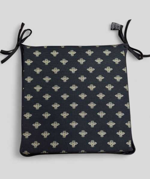 Black square shaped seat pads with an all over small gold bee print