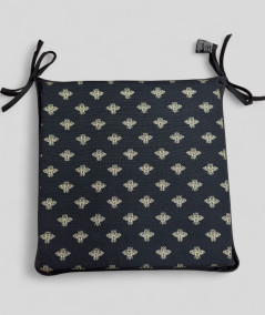 Black square shaped seat pads with an all over small gold bee print