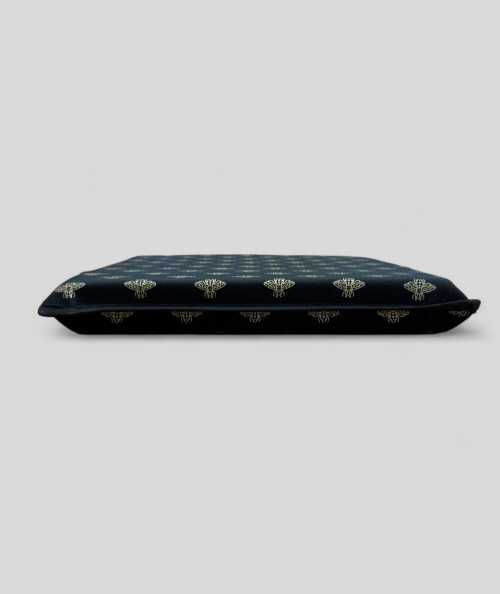 Black square shaped seat cushions with an all over small gold bee print