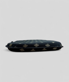Black spindle shaped seat cushions with an all over small gold bee print