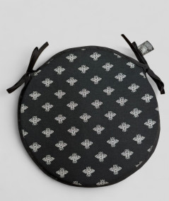 Round black seat pads with an all over small silver bee design