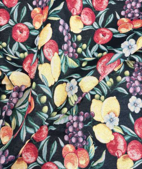 Black tapestry fabric with a multi-coloured fruit design