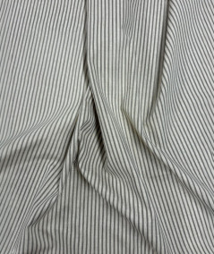 Grey and beige thinly striped fabric