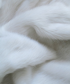 Plain white faux fur bed runner